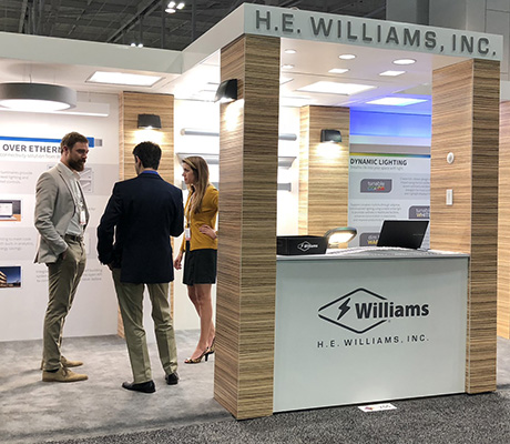 Modern H.E. Williams, Inc. tradeshow booth featuring our PoE and dynamic lighting solutions